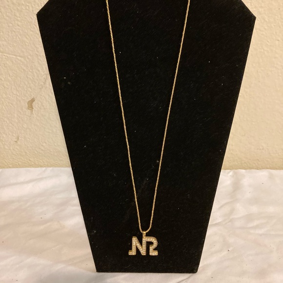 Eskimo Nina Ricci Gold NR Pendant Necklace